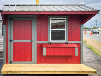A red custom chicken coop for sale in Kentucky