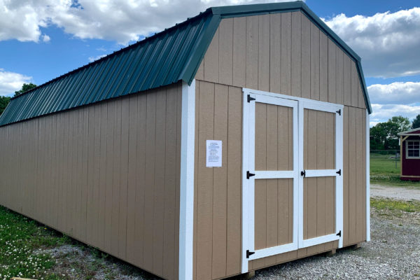 exterior of brown and white high barn painted wood shed for sale in KY and TN