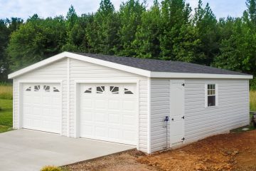 A double-wide modular garage with vinyl siding.