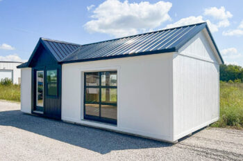 white ranch tiny house shells with dormer and black metal roof for sale in Kentucky